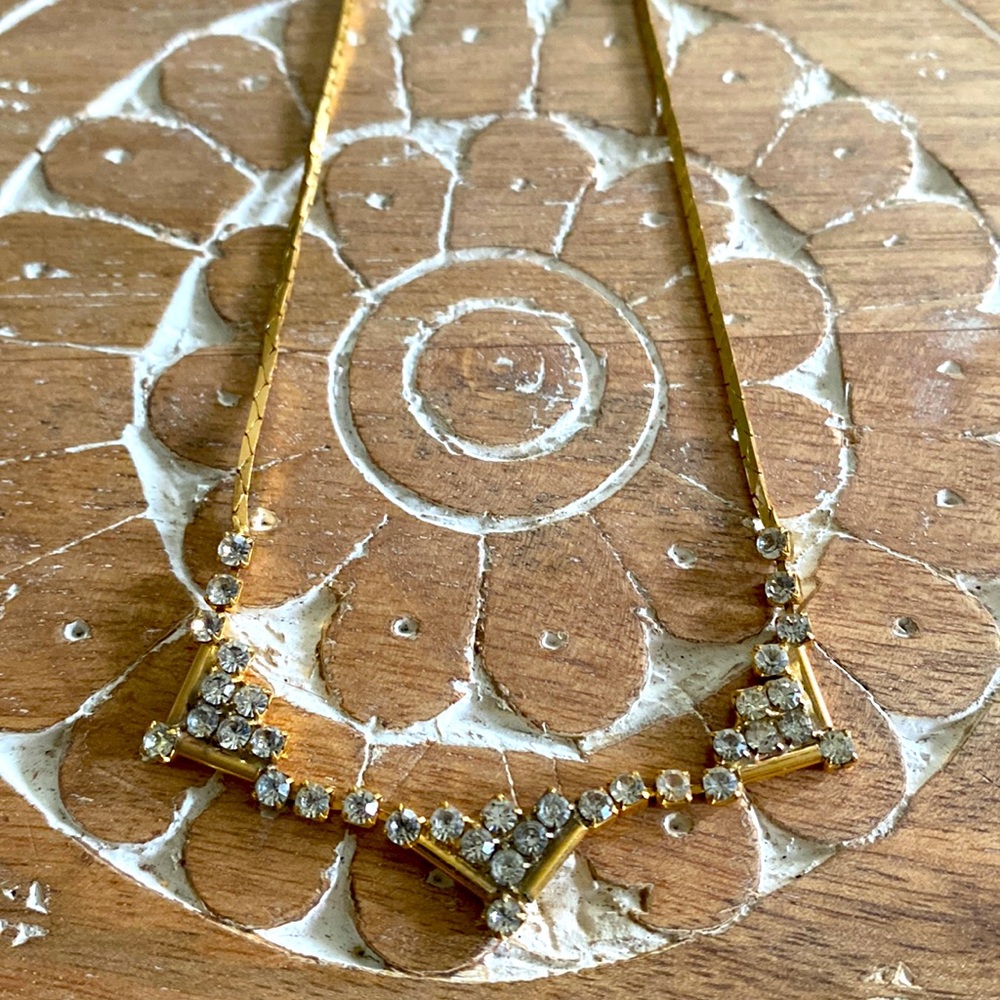 Gold and CZ necklace.